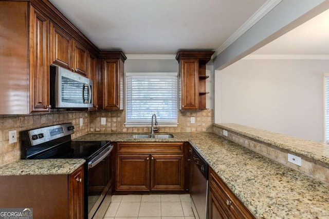 kitchen featuring decorative backsplash, stainless steel appliances, crown molding, sink, and light tile patterned floors