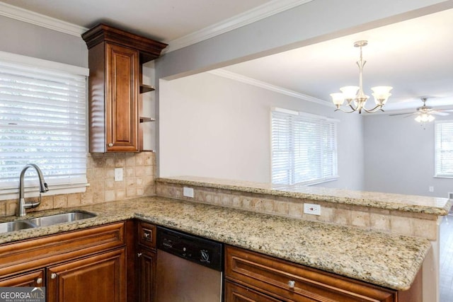 kitchen featuring dishwasher, ceiling fan with notable chandelier, hanging light fixtures, sink, and kitchen peninsula