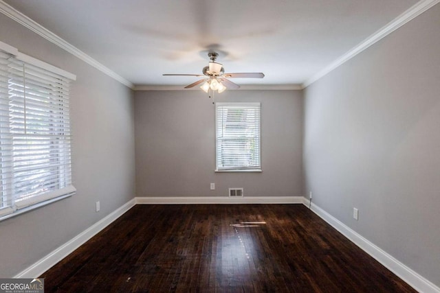 unfurnished room featuring dark hardwood / wood-style flooring, ceiling fan, and crown molding