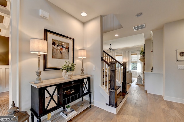 interior space featuring ceiling fan and light wood-type flooring