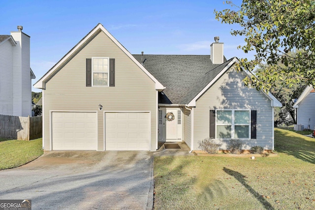 view of front facade featuring a front lawn and a garage