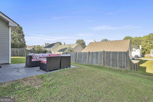 view of yard with outdoor lounge area and a patio