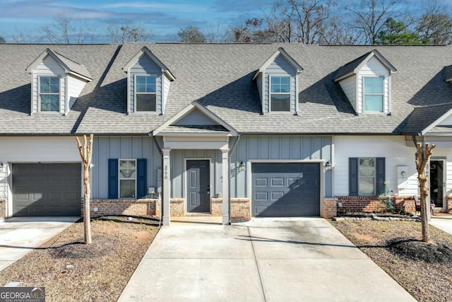 new england style home with a garage