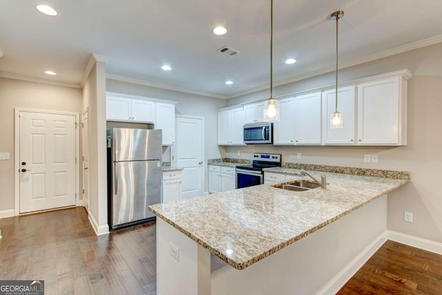 3770 Shades Valley Ln, Gainesville, GA 30501 - kitchen featuring pendant lighting, stainless steel appliances, white cabinetry, and sink