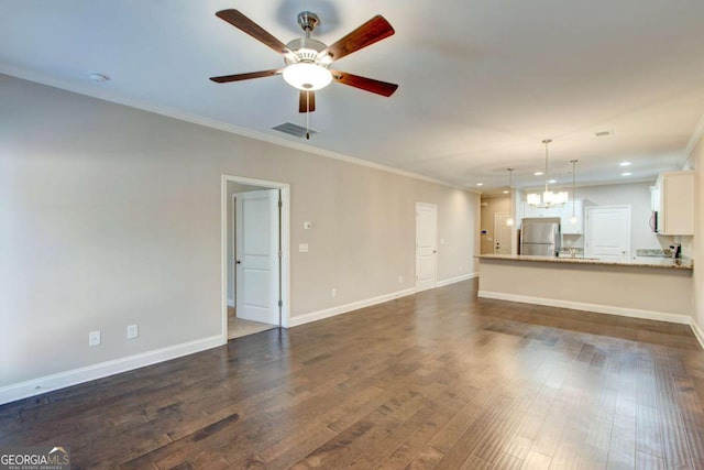 3770 Shades Valley Ln, Gainesville, GA 30501 - unfurnished living room with dark hardwood / wood-style floors, ceiling fan with notable chandelier, and ornamental molding