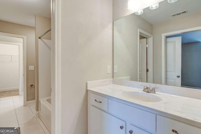 3770 Shades Valley Ln, Gainesville, GA 30501 - bathroom with tile patterned floors and vanity