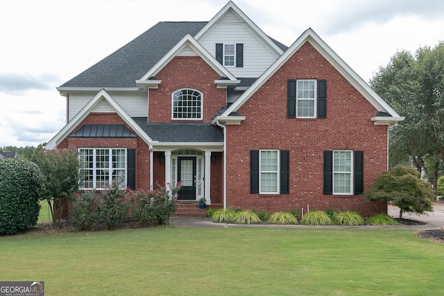 view of front facade with a front lawn