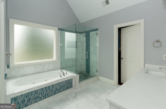 bathroom with shower with separate bathtub, vanity, and lofted ceiling