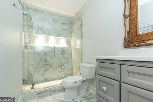 bathroom with vanity, an enclosed shower, and toilet