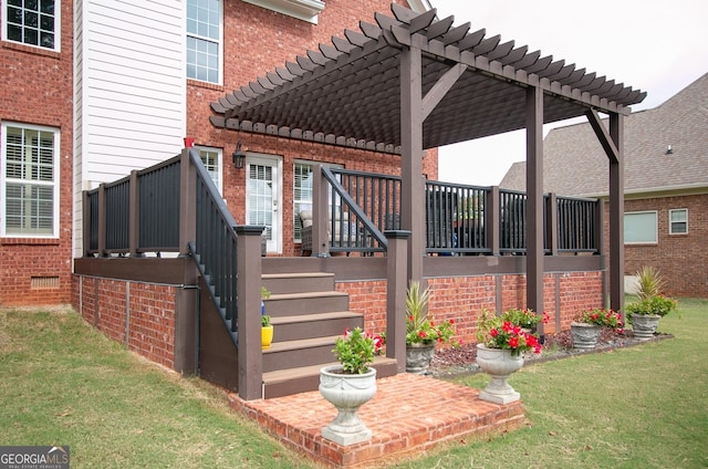 wooden deck featuring a pergola and a yard