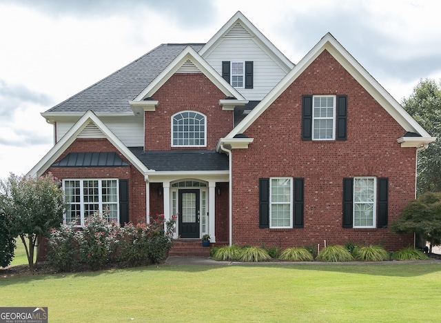 view of front of home featuring a front lawn