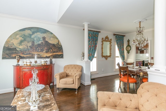 living area with crown molding, dark wood-type flooring, and decorative columns