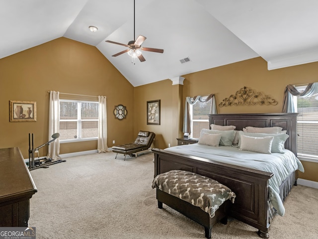 bedroom featuring ceiling fan, light colored carpet, and vaulted ceiling