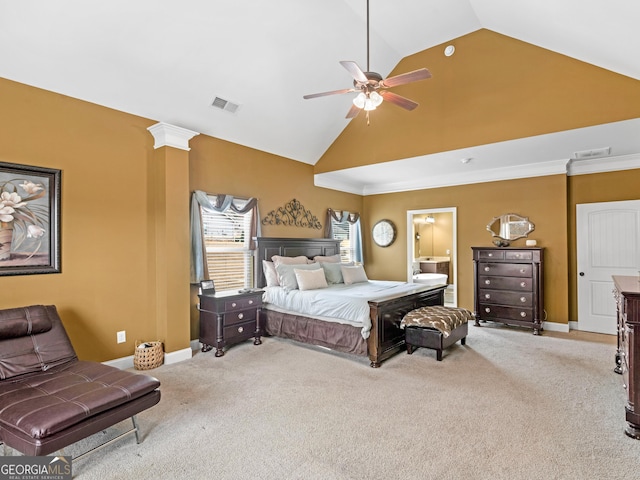 bedroom with light carpet, vaulted ceiling, ceiling fan, and ornate columns