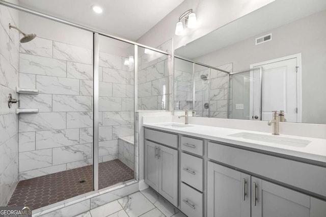 bathroom featuring vanity and walk in shower