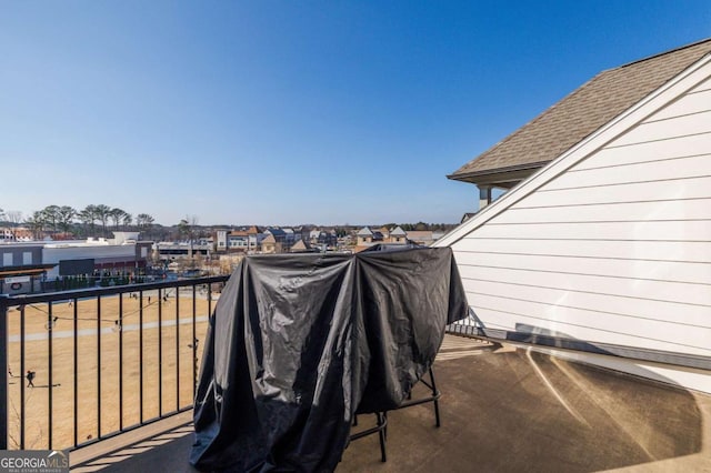 view of patio with a balcony