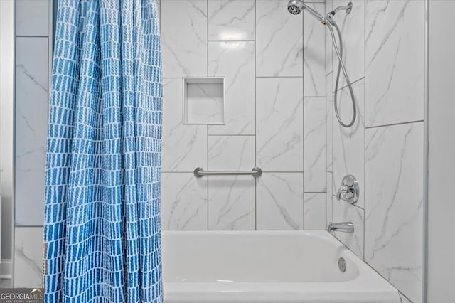 full bathroom featuring shower / bath combination with curtain