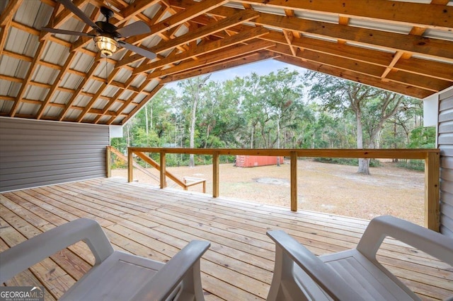 wooden deck featuring a ceiling fan