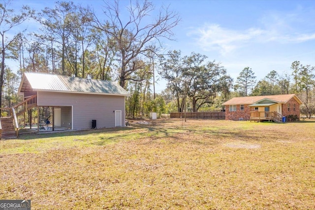 view of yard featuring a wooden deck