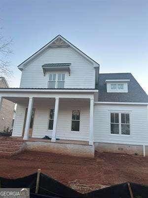 view of front of house featuring covered porch