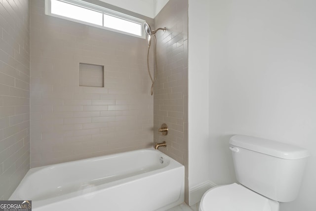 full bath featuring toilet and shower / tub combination