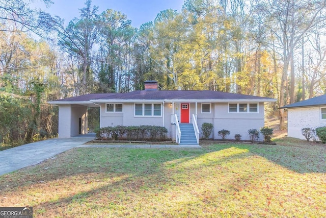 ranch-style house with a front lawn and a carport