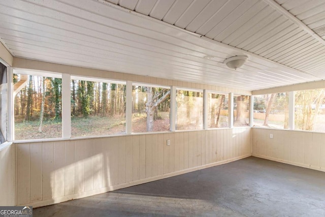 unfurnished sunroom with a healthy amount of sunlight