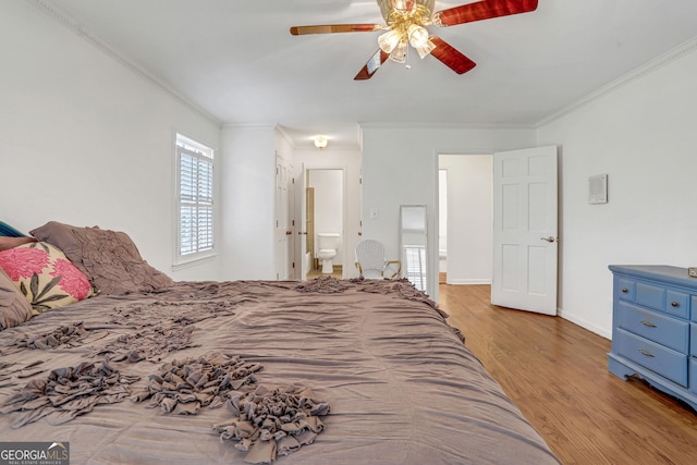 bedroom featuring ornamental molding, light hardwood / wood-style flooring, connected bathroom, and ceiling fan