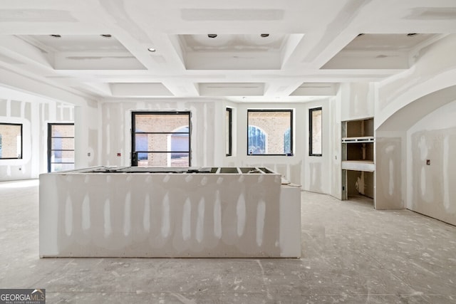 interior space featuring beam ceiling and coffered ceiling