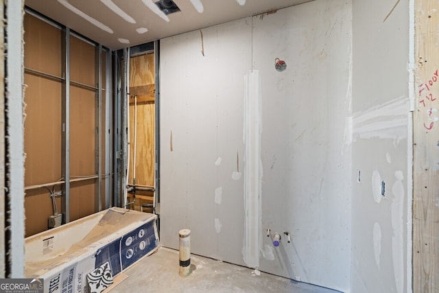 bathroom with concrete floors