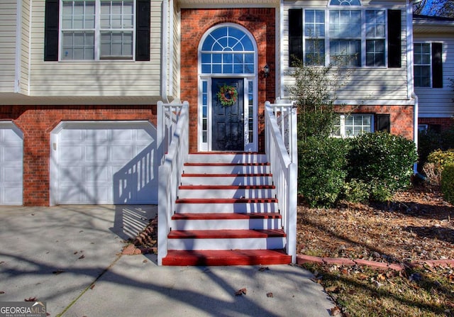 property entrance featuring a garage