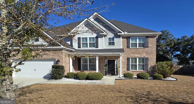 view of front of home with a garage