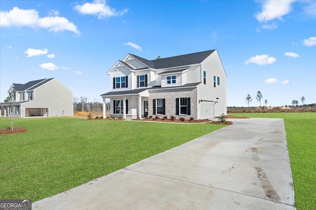 modern farmhouse style home with a front yard, driveway, and an attached garage