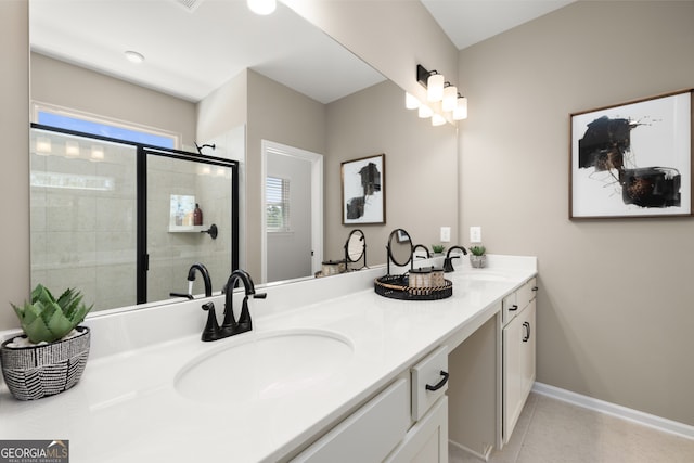 bathroom featuring walk in shower, vanity, tile patterned floors, and a wealth of natural light