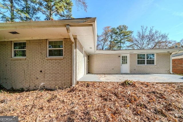 rear view of house with a patio area