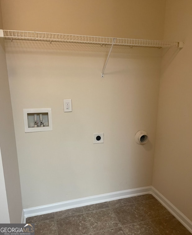 laundry room with hookup for an electric dryer and washer hookup