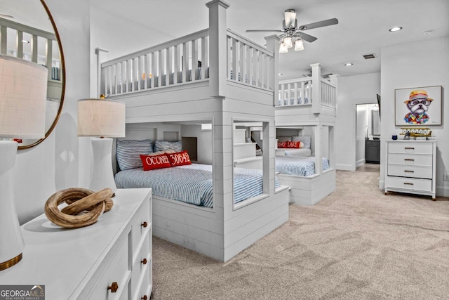 carpeted bedroom featuring ceiling fan