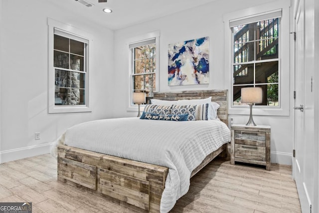 bedroom featuring hardwood / wood-style floors