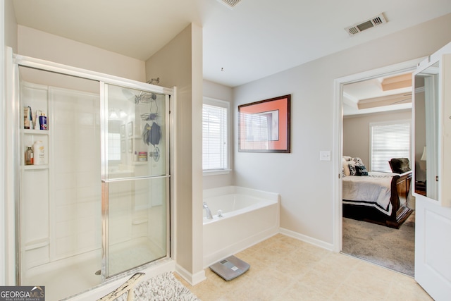 full bathroom with visible vents, a stall shower, ensuite bath, baseboards, and a bath