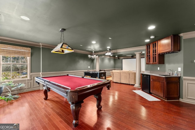 recreation room with crown molding, pool table, and dark hardwood / wood-style floors