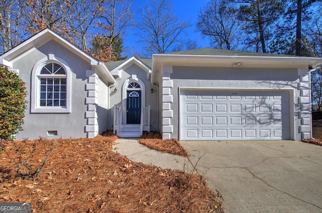 ranch-style house with a garage