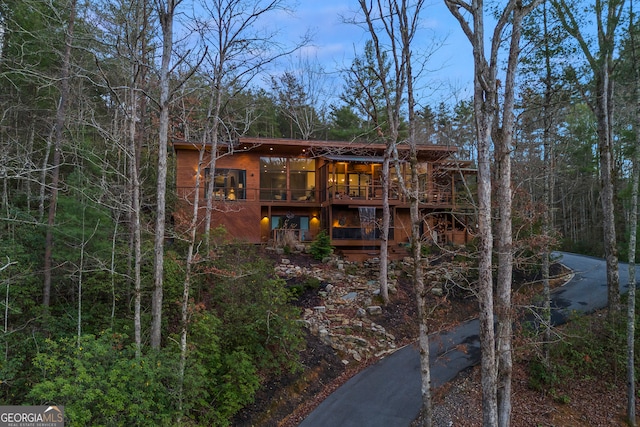 rear view of property with a deck