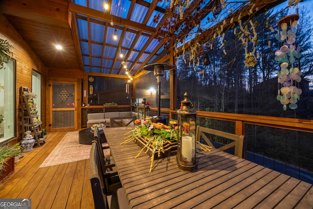 wooden terrace featuring outdoor lounge area and a pergola