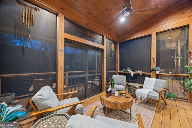 sunroom with vaulted ceiling and wooden ceiling