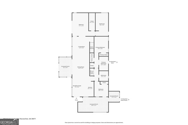 living room featuring a towering ceiling, floor to ceiling windows, a fireplace, and light tile patterned floors