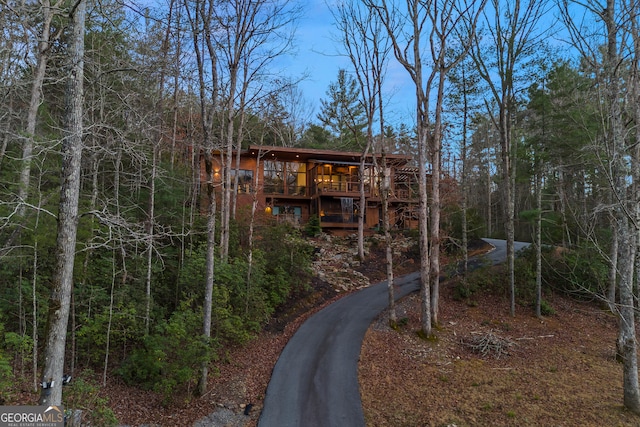 back of house featuring a deck