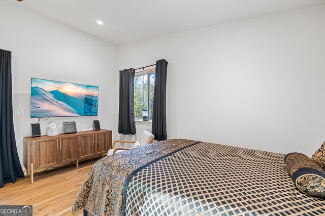 bathroom featuring a skylight, a wall mounted AC, walk in shower, toilet, and a bidet