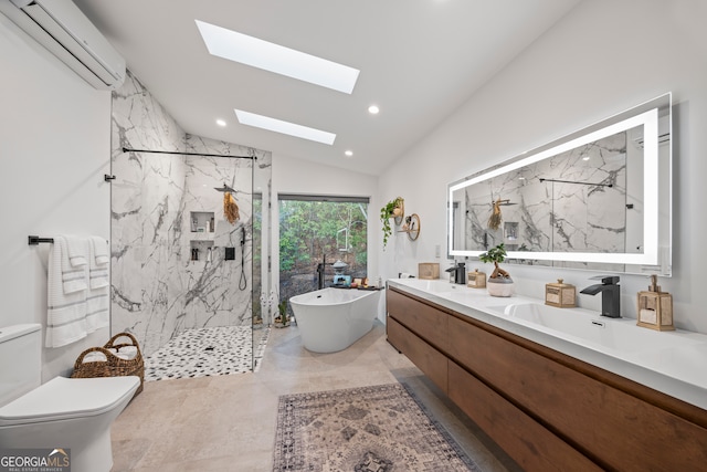 full bathroom featuring shower with separate bathtub, vaulted ceiling with skylight, vanity, toilet, and a wall unit AC