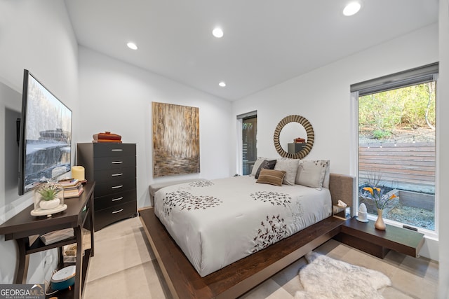 bedroom featuring vaulted ceiling