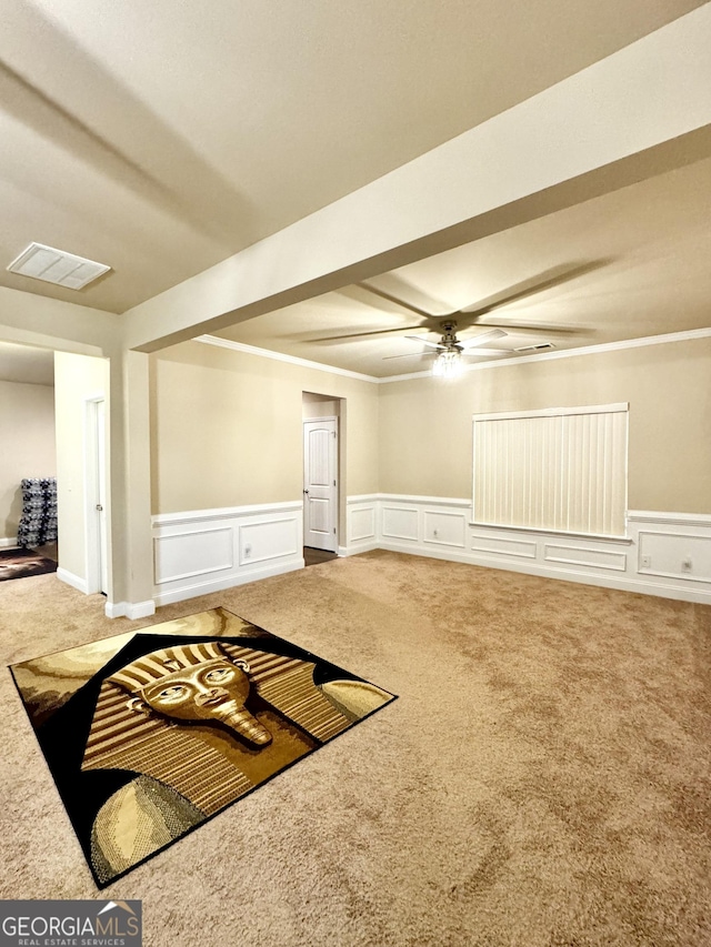 unfurnished room with ceiling fan and carpet floors